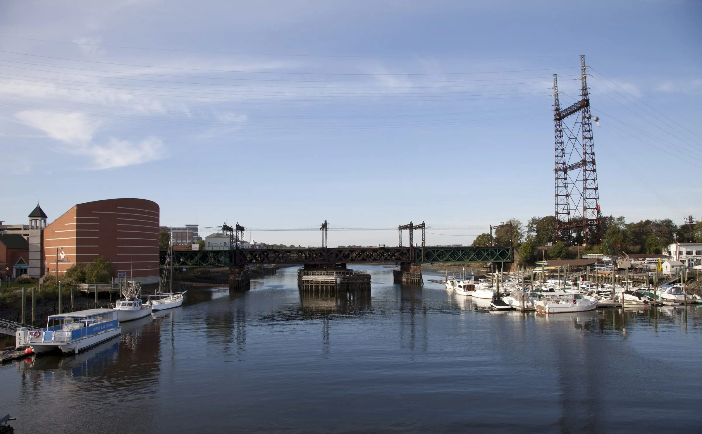 The Norwalk River at South Norwalk, with the Maritime Aquarium, the Washington Street bridge and the Walk Bridge lift towers