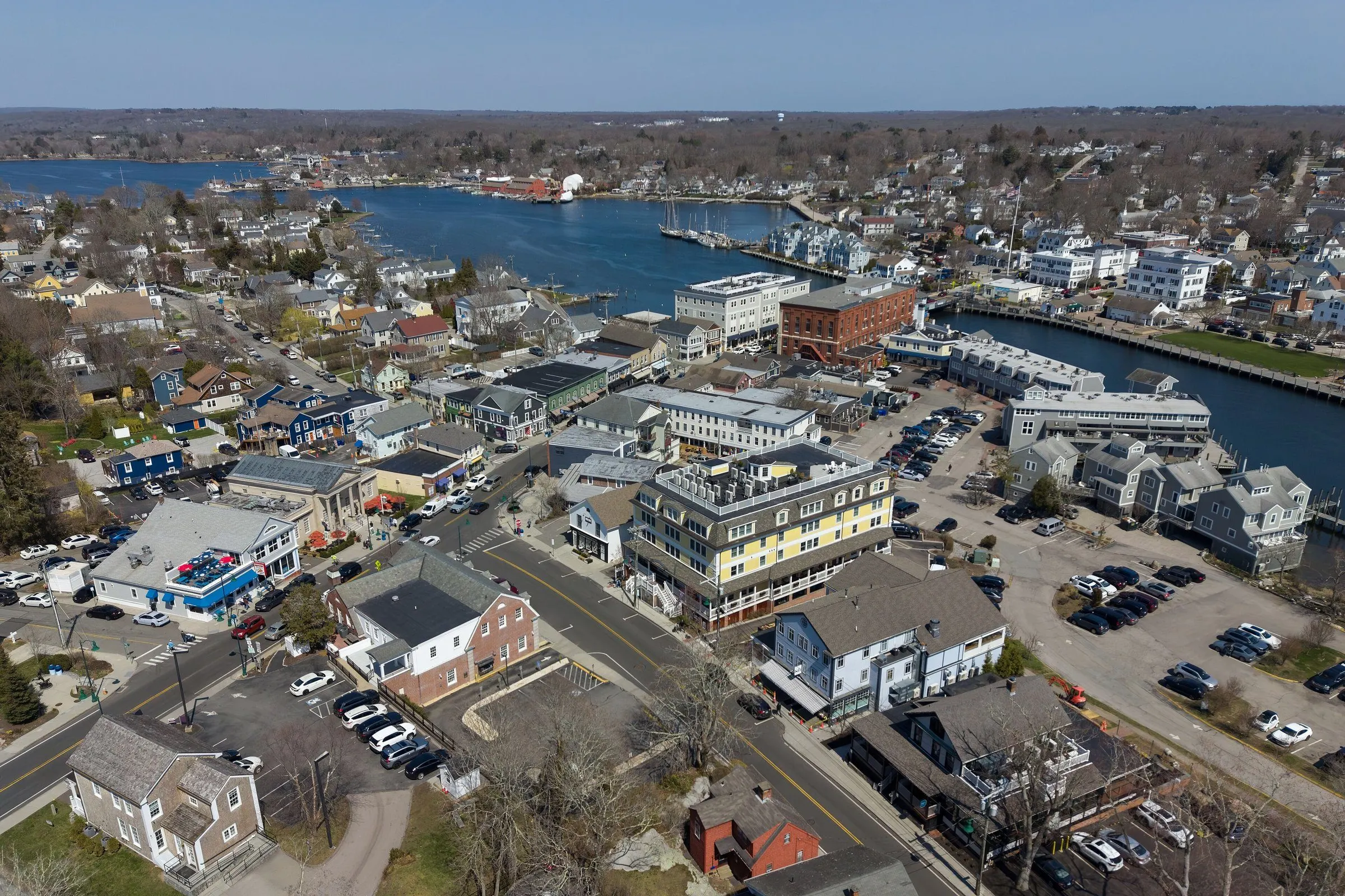 Aerial view of the Mystic River and the waterfront streets of downtown Mystic on the Groton side